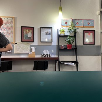 Healthy Noodle House - a woman standing at a table - Chinese Near Me - Vancouver, British Columbia Healthy Noodle House - a woman standing at a table - Chinese Near Me - Vancouver, British Columbia