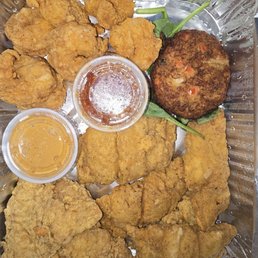 This is a pan of fish, shrimp and a crab cake. My damn cholesterol is high, but I am NOT sharing!! Delicious!!! This is a pan of fish, shrimp and a crab cake. My damn cholesterol is high, but I am NOT sharing!! Delicious!!!