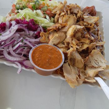 Taksim Doner - "Serving for one". Which we shared and could barely finish due to volume! Chicken and different salads. - Middle Eastern Near Me - Toronto, Ontario