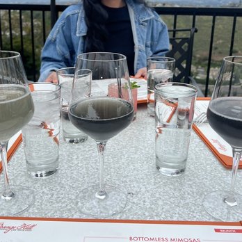 Orange Hill Restaurant & Events - 3 Charcoal Lavender Mimosas, freshly served to us and apparently "the same" - Steakhouses Near Me - Orange, California