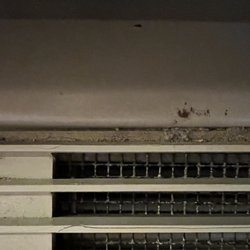 Quality Inn - Dirty heater vent. This unit is very old also smelt when it was running but I guess at least it ran.