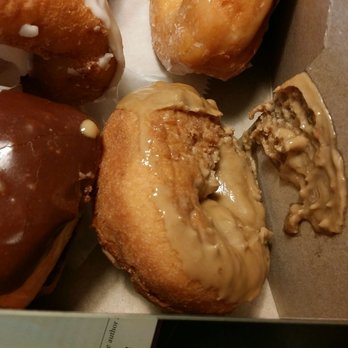 LaMar's Donuts and Coffee - Oh no! He placed the donut incorrectly and the icing came off. - Donuts Near Me - Liberty, Missouri