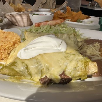 Pancho Pistolas - Steak Enchilada Suizas with green sauce - Mexican Near Me - Chicago, Illinois Pancho Pistolas - Steak Enchilada Suizas with green sauce - Mexican Near Me - Chicago, Illinois