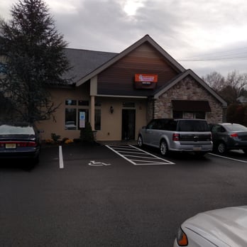 Dunkin' - a parking lot with cars parked in front of it - Coffee & Tea Near Me - Washington Crossing, Pennsylvania Dunkin' - a parking lot with cars parked in front of it - Coffee & Tea Near Me - Washington Crossing, Pennsylvania