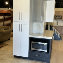Flooring Creations - Beautiful kitchenettes featuring our collection of cabinets.
