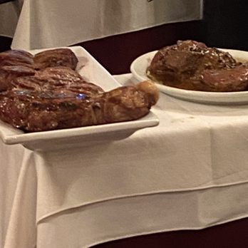 La Brigada - The platter with our steaks. Some ordered with a pepper corn sauce that they highly recommended. - Steakhouses Near Me - Buenos Aires, C