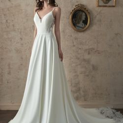 High Vibe Bride - Crepe modern clean Aline wedding dress, with sheer lace side details.