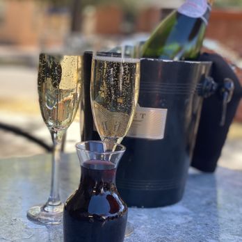Slate Street Cafe - two glasses of champagne and a bottle of wine - New American Near Me - Albuquerque, New Mexico Slate Street Cafe - two glasses of champagne and a bottle of wine - New American Near Me - Albuquerque, New Mexico