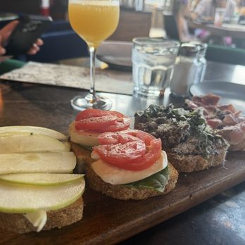 Postino Bryker Woods - Bruschetta fig and apple with brie cheese, basil mozzarella and tomatoes, mushroom and cheese, prosciutto and cheese - Wine Bars Near Me - Austin, Texas