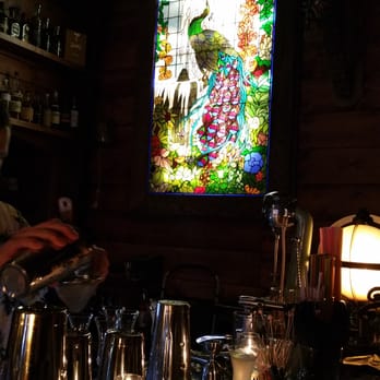Pagan Idol - Stained glass window behind the bar - Tiki Bars Near Me - San Francisco, California Pagan Idol - Stained glass window behind the bar - Tiki Bars Near Me - San Francisco, California