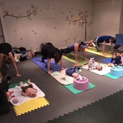 Fitness by the Lake - Mountain climbers while babies cheer mom on
