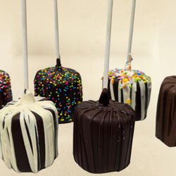 Terri Sue's Toffee & Treats - Giant marshmallows on a stick, hand-dipped in creamy chocolate & finished with a chocolate drizzle. A kid favorite, made in Chico.