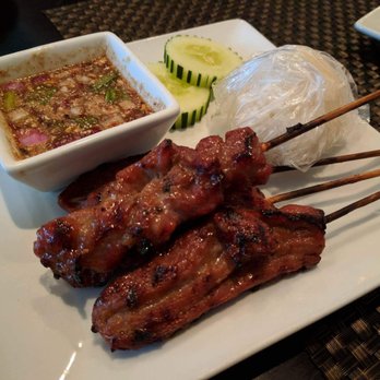 Thai Kitchen By Saowanee - Moo ping appetizer, grilled chicken skewers with sticky rice and an authentic (like Cambodian) tangy, herby dipping sauce - Thai Near Me - Port Orange, Florida