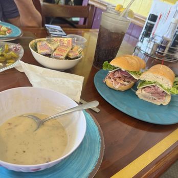Ellie's Downtown Deli & Catering - Remaining amount of clam chowder with pic of sandwich and fish dip - Desserts Near Me - Stuart, Florida