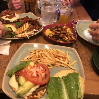 Geronimo Brewing at Lilly’s Jury Room - a table full of food - New American Near Me - Doylestown, Pennsylvania Geronimo Brewing at Lilly’s Jury Room - a table full of food - New American Near Me - Doylestown, Pennsylvania