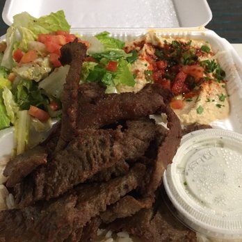 Chicken Maison - Gyro on a bed of rice with hummus and salad - Middle Eastern Near Me - Redondo Beach, California Chicken Maison - Gyro on a bed of rice with hummus and salad - Middle Eastern Near Me - Redondo Beach, California