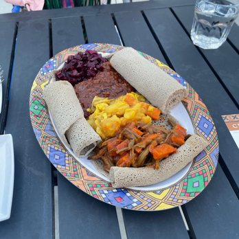 Goorsha - Yemisir Kik, Tejal Gomen, Fosolia, and a side of beets was - Ethiopian Near Me - Durham, North Carolina Goorsha - Yemisir Kik, Tejal Gomen, Fosolia, and a side of beets was - Ethiopian Near Me - Durham, North Carolina