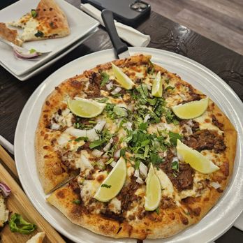 Sorianos Pizzeria - Birria Pizza with consumel. - Salad Near Me - San Diego, California Sorianos Pizzeria - Birria Pizza with consumel. - Salad Near Me - San Diego, California