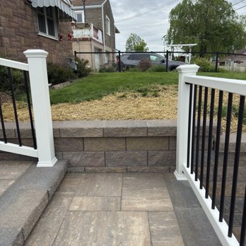 Lehman's Landscaping & Concrete - Landing on the new stairs, railings and retaining wall. - Landscaping Near Me - Powhatan Point, Ohio Lehman's Landscaping & Concrete - Landing on the new stairs, railings and retaining wall. - Landscaping Near Me - Powhatan Point, Ohio