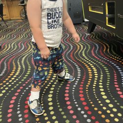 Thunder Bowl - My 2 year blending in with the carpet and enjoying his first time bowling Shoes Rental Shoes Rental Thunderbowl