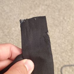 Other side of damaged pants clip