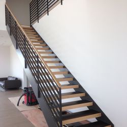 FZ Ogawa Flooring - We cover steel frame steps with solid oak wood.