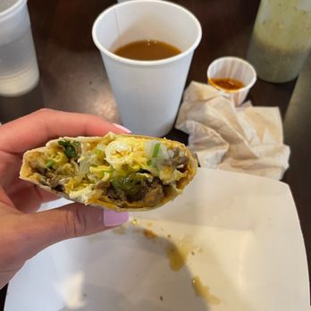 Salsa Limón - Carne burrito with eggs beans onions cilantro salsa etc. - this was AMAZING especially with their salsa verde - Breakfast & Brunch Near Me - Fort Worth, Texas