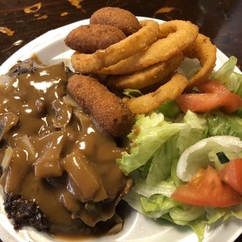 Cubbie's - Hamburger steak plate with onion rings, hush puppies and a salad - Burgers Near Me - Greenville, North Carolina Cubbie's - Hamburger steak plate with onion rings, hush puppies and a salad - Burgers Near Me - Greenville, North Carolina