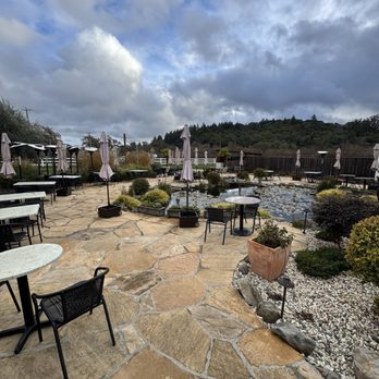 Salt & Stone - Outdoor patio seating with pond. - Wine Bars Near Me - Kenwood, California