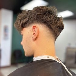 Beardsley's Barber Shop - Low-mid skin drop fade, leave the bulk