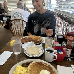 Huevos Rancheros and scrambled eggs, pancakes, and sausage. This place rocks! Huevos Rancheros and scrambled eggs, pancakes, and sausage. This place rocks!