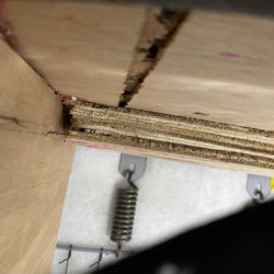 Crate & Barrel Outlet - Cracked base, front of sofa