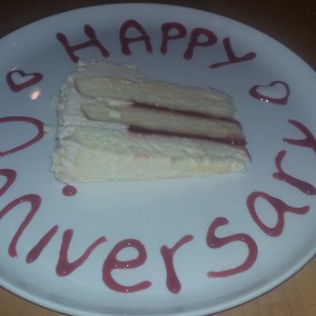 BB's - Raspberry sheet cake with a layer of cheesecake and raspberry sauce, covered in buttercream and white chocolate shavings, :) - New American Near Me - Jacksonville, Florida