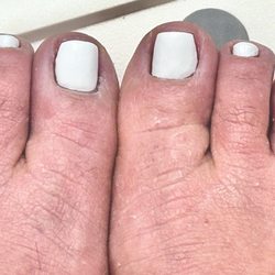 She cut my side of my nails off not straight on the side and all my corners are gone and uneven shape n Cuticle it's not clean.