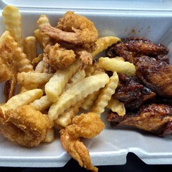 Five shrimp, five wings (jerk) and fries