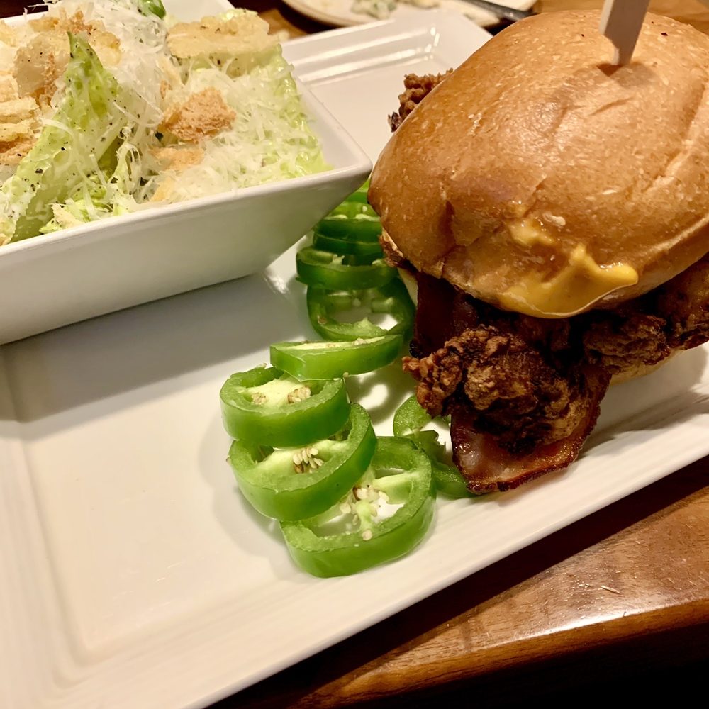 Lodge Kitchen - Fried chicken sandwich. I got this with jalapeños and a Caesar and it was delicious. Would get this again. - New American Near Me - Sunriver, Oregon Lodge Kitchen - Fried chicken sandwich. I got this with jalapeños and a Caesar and it was delicious. Would get this again. - New American Near Me - Sunriver, Oregon