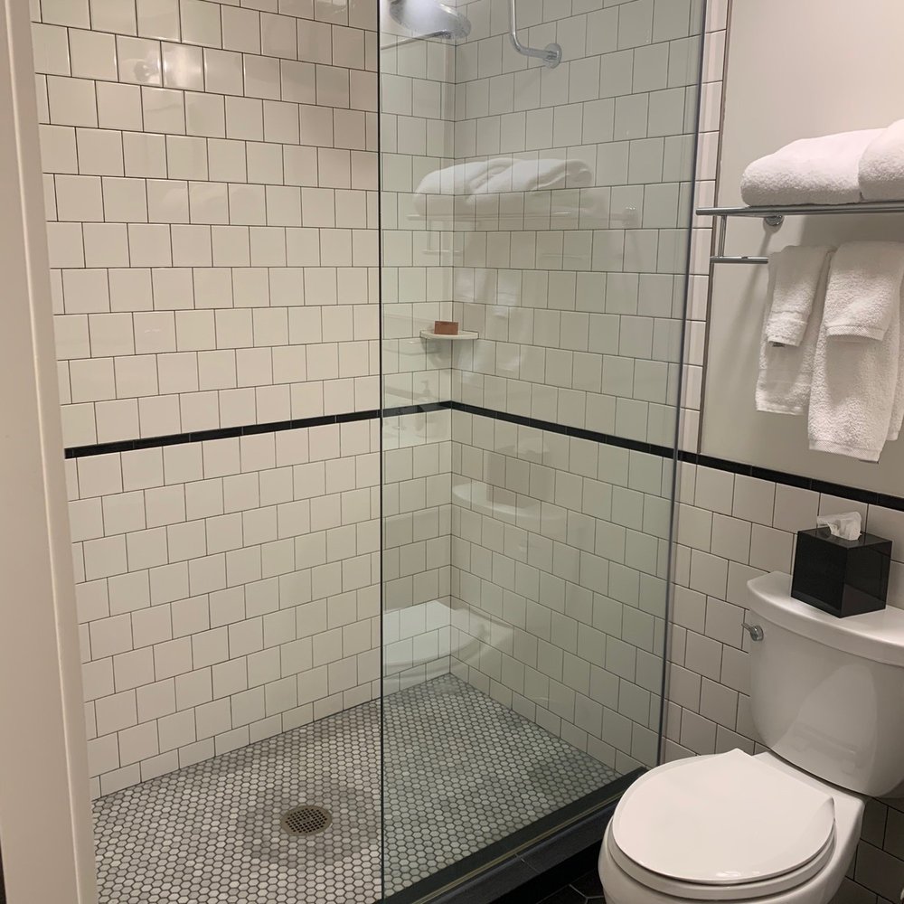 The State Hotel - King bed city view - bathroom - Hotels Near Me - Seattle, Washington The State Hotel - King bed city view - bathroom - Hotels Near Me - Seattle, Washington