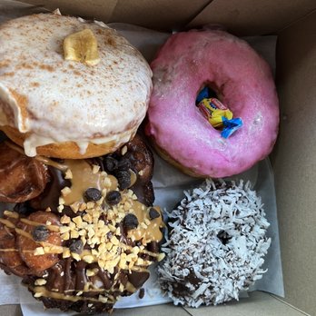 Voodoo Doughnut - Banana cream, Memphis Mafia, Coconut and bubblegum something or another's (forgot the names) - Donuts Near Me - Houston, Texas Voodoo Doughnut - Banana cream, Memphis Mafia, Coconut and bubblegum something or another's (forgot the names) - Donuts Near Me - Houston, Texas
