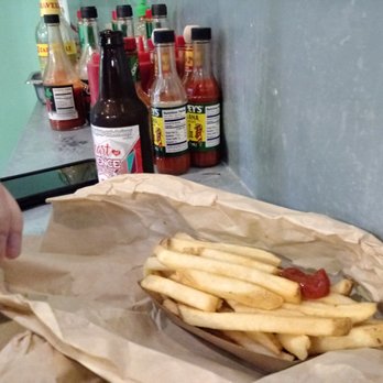 Newman's Grotto - fries (chips!), and a plethora of sauces available in the background. good flavor but should've requested extra crispy. - Seafood Markets Near Me - Eugene, Oregon Newman's Grotto - fries (chips!), and a plethora of sauces available in the background. good flavor but should've requested extra crispy. - Seafood Markets Near Me - Eugene, Oregon