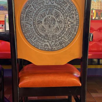 Lupitas Tex-Mex - Thee chairs are grouped with specific art pieces. - Tex-Mex Near Me - Lake Worth, Florida Lupitas Tex-Mex - Thee chairs are grouped with specific art pieces. - Tex-Mex Near Me - Lake Worth, Florida