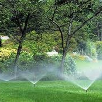 AZ Grounds Landscape Management - a sprinkler spraying water on a lawn - Landscaping Near Me - Gilbert, Arizona AZ Grounds Landscape Management - a sprinkler spraying water on a lawn - Landscaping Near Me - Gilbert, Arizona