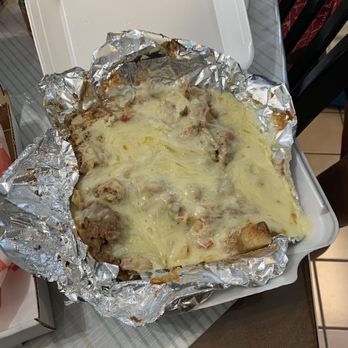 Chris Madrid's - Chacho's Nacho's - super cheesy and only $15. No up charge for chicken. - Burgers Near Me - San Antonio, Texas