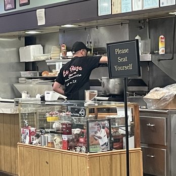La Plaza Mexican Restaurant - a man preparing food - Mexican Near Me - Houston, Texas La Plaza Mexican Restaurant - a man preparing food - Mexican Near Me - Houston, Texas