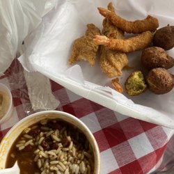 Kajun King - Watery red beans and rice, soft hush puppies, frozen seafood, small fish