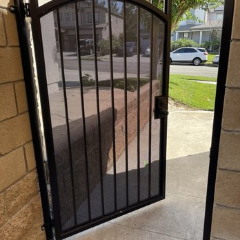 Inland Empire Fence & Construction - Black iron side gate - back view - Fences & Gates Near Me - Montclair, California Inland Empire Fence & Construction - Black iron side gate - back view - Fences & Gates Near Me - Montclair, California