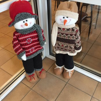 Dunkin' - two snowmen standing in front of a glass door - Donuts Near Me - Campton, New Hampshire Dunkin' - two snowmen standing in front of a glass door - Donuts Near Me - Campton, New Hampshire