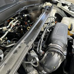 Jiffy Lube - Damage from oil cap being left off after oil change