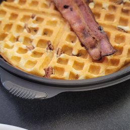 bacon on top of a waffle