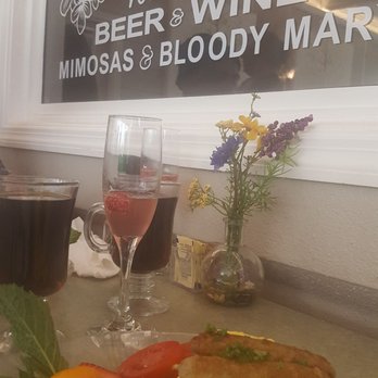Wildflower Cafe - Avocado toast Challah, Cupid's Kiss Champagne, and they brew their own brand of coffee. Yum-yum! - Breakfast & Brunch Near Me - Clearwater, Florida