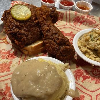 Rockys Hot Chicken Shack - Thigh and leg plate with corn pudding and mashed potatoes with gravy - Sandwiches Near Me - Greenville, South Carolina Rockys Hot Chicken Shack - Thigh and leg plate with corn pudding and mashed potatoes with gravy - Sandwiches Near Me - Greenville, South Carolina